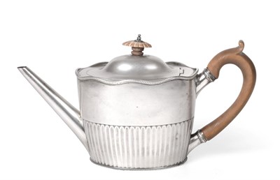 Lot 93 - A George III Silver Teapot, by Robert Hennell, London, 1787, tapering oval and with part-fluted...