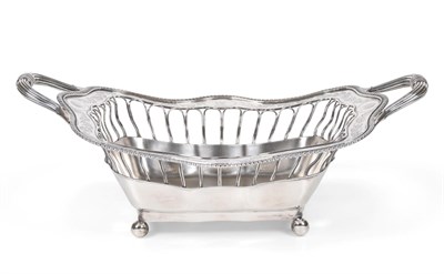 Lot 115 - A George III Silver Basket, by Ann Robinson, Newcastle, 1808, shaped oblong and on four ball...