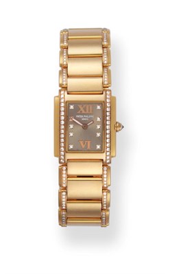 Lot 185 - A Lady's 18ct Rose Gold Diamond Set Wristwatch, signed Patek Philippe, model: Twenty 4, ref:...