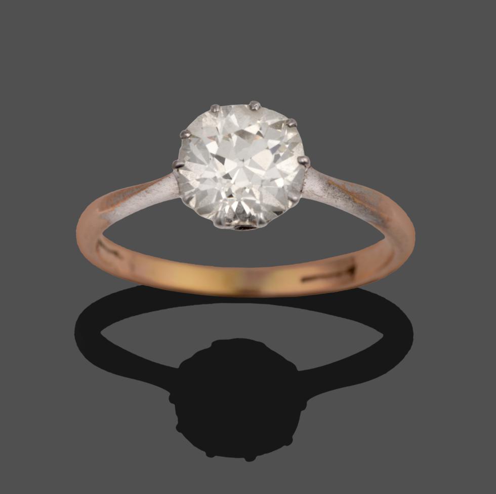 Lot 234 - A Diamond Solitaire Ring, circa 1930, the old cut diamond in white claws, to white fronted...