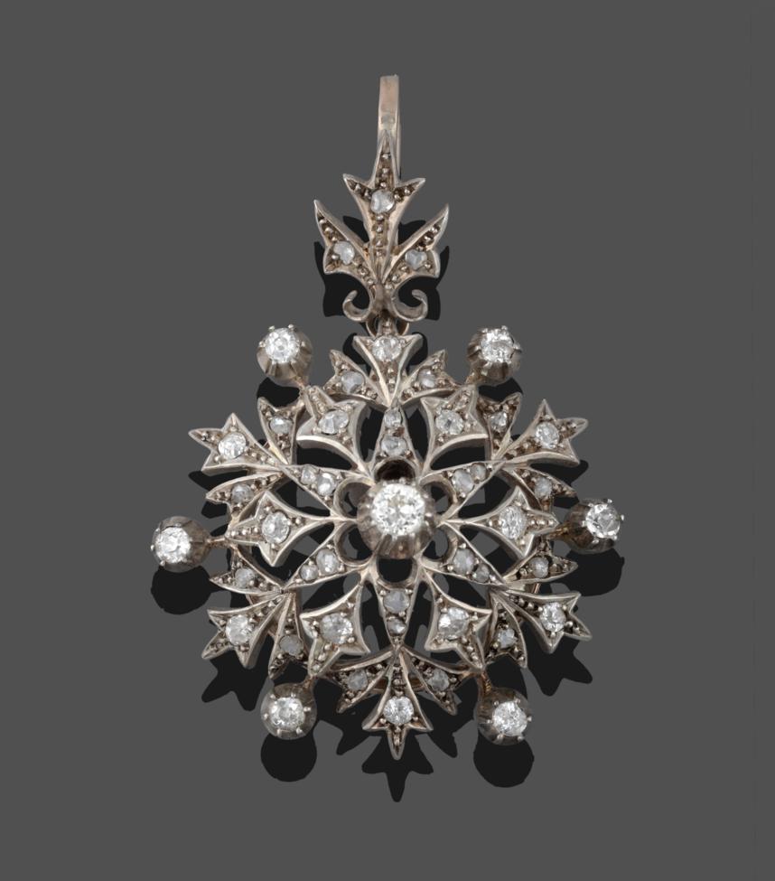 Lot 240 - A 19th Century Diamond Starburst Pendant, old cut and rose cut diamonds in white claw settings...