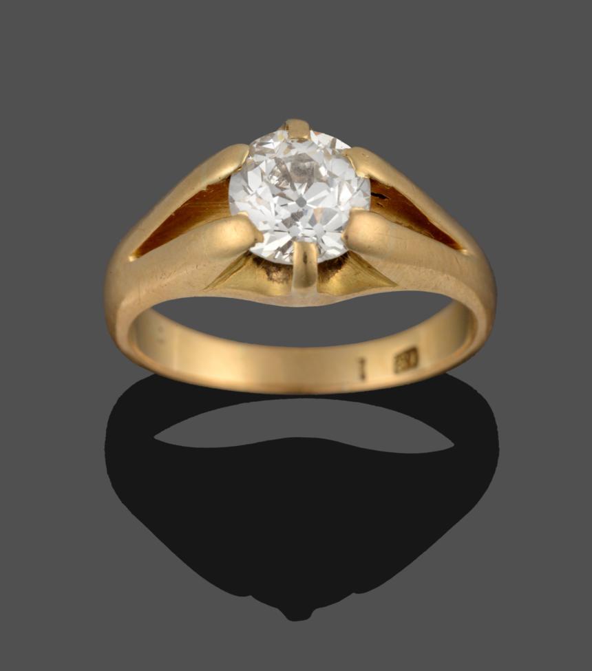 Lot 248 - A Diamond Solitaire Ring, the old cut diamond in a yellow six claw setting on a split...