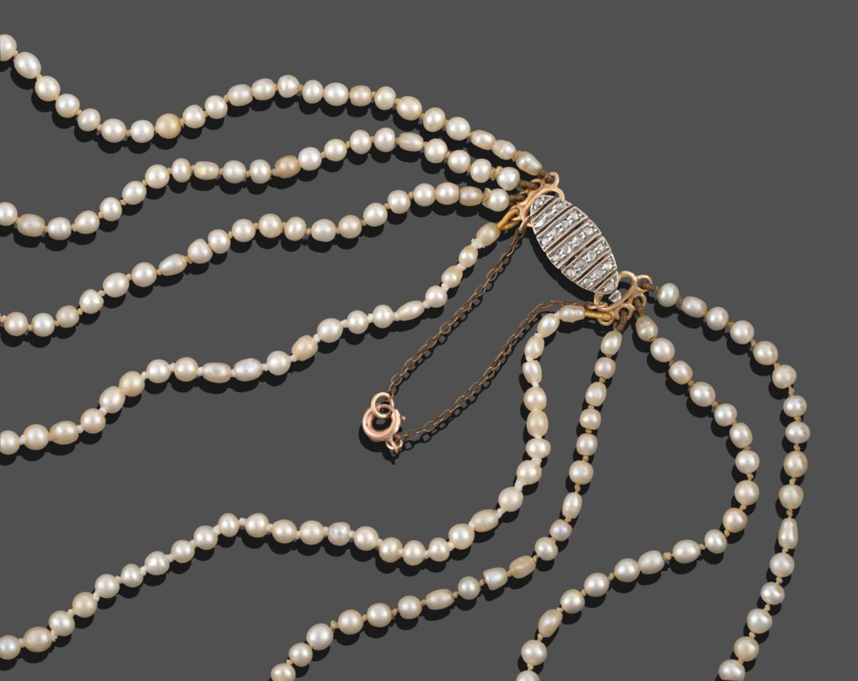 Lot 253 - A Four Row Pearl Necklace, the off-round 101:105:114:120 pearls strung to a lozenge shaped...
