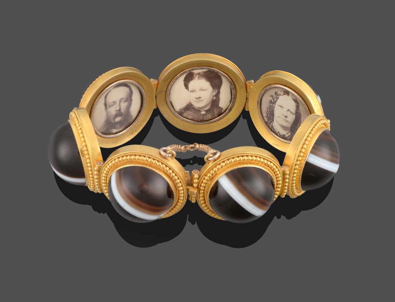 Lot 254 - A Victorian Sardonyx Bracelet, seven cabochon sardonyx in yellow rubbed over settings with...
