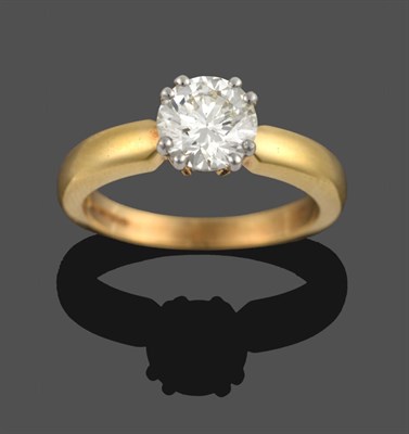 Lot 262 - An 18 Carat Gold Diamond Solitaire Ring, the round brilliant cut diamond in a white claw setting on