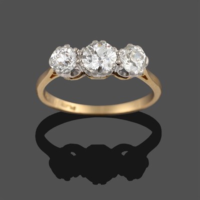 Lot 266 - A Diamond Three Stone Ring, the graduated old cut diamonds in white double claw settings, to a...