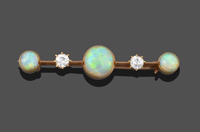 Lot 287 - An Opal and Diamond Bar Brooch, three oval cabochon opals in yellow collet settings alternate...