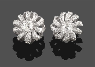 Lot 295 - A Pair of Diamond Cluster Earrings, an old cut diamond in white claw settings centres graduated...