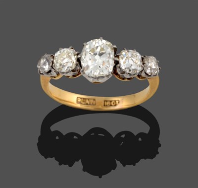 Lot 312 - A Diamond Five Stone Ring, the graduated old cut diamonds in white claw settings on a yellow...