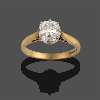 Lot 313 - An 18 Carat Gold Diamond Solitaire Ring, the old mine cut diamond in a white claw setting, to a...