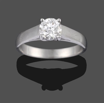 Lot 318 - An 18 Carat White Gold Diamond Solitaire Ring, the round brilliant cut diamond in a four claw...