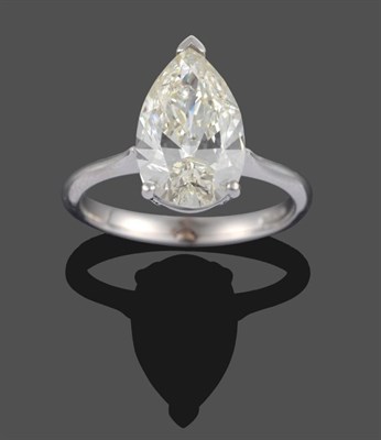 Lot 320 - An 18 Carat White Gold Pear Cut Diamond Solitaire Ring, the pear cut diamond in a three claw...