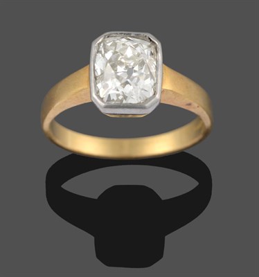 Lot 326 - An 18 Carat Gold Diamond Solitaire Ring, the old mine cut diamond in a modern setting, a white...