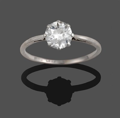 Lot 338 - A Diamond Solitaire Ring, a round brilliant cut diamond in a white claw setting, to a tapered...