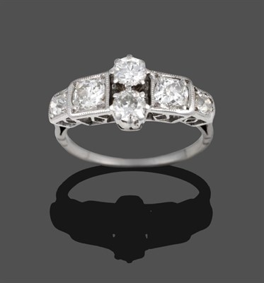 Lot 341 - A Diamond Ring, circa 1930, two old cut diamonds vertically claw set to the centre, an old cut...