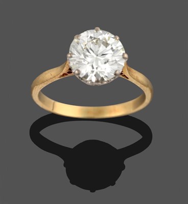Lot 353 - An 18 Carat Gold Diamond Solitaire Ring, the round brilliant cut diamond in a white claw setting to