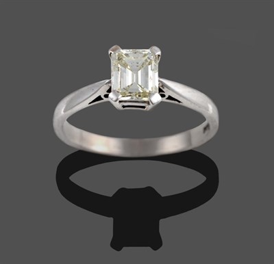 Lot 360 - An 18 Carat White Gold Diamond Solitaire Ring, the emerald-cut diamond in a four claw setting...