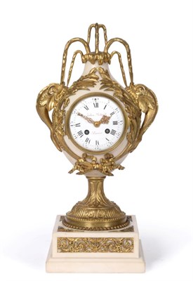 Lot 564 - A French Alabaster and Gilt Metal Mounted Striking Mantel Clock, early 20th century, urn shaped...
