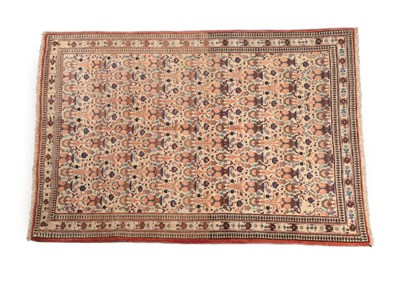 Lot 609 - Veramin Rug of unusual size Central Iran, circa 1940 The cream field with rows of urns issuing...