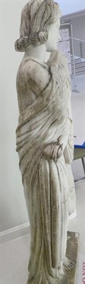 Lot 640 - After the Antique: A White Marble Figure of a Maiden, wearing loose robes standing on a rectangular