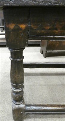 Lot 661 - A Late 17th Century Joined Oak Long Table, of rectangular form and three plank construction...