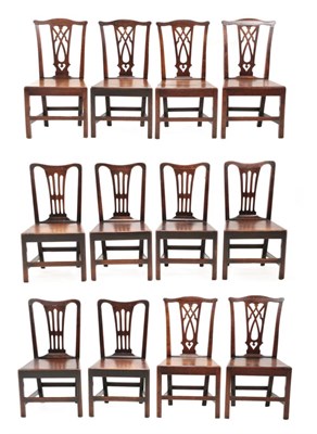 Lot 663 - A Set of Six Mid 18th Century Oak Country Dining Chairs, with pierced splats above solid seats...