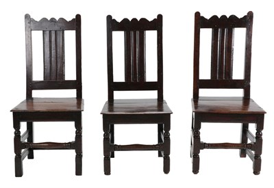 Lot 668 - A Set of Three English Joined Oak Back Stools, circa 1700, each seat rail stamped EI, with wavy...
