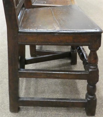 Lot 669 - A Pair of Joined Oak Back Stools, English or Welsh, circa 1700, with slatted back supports and...