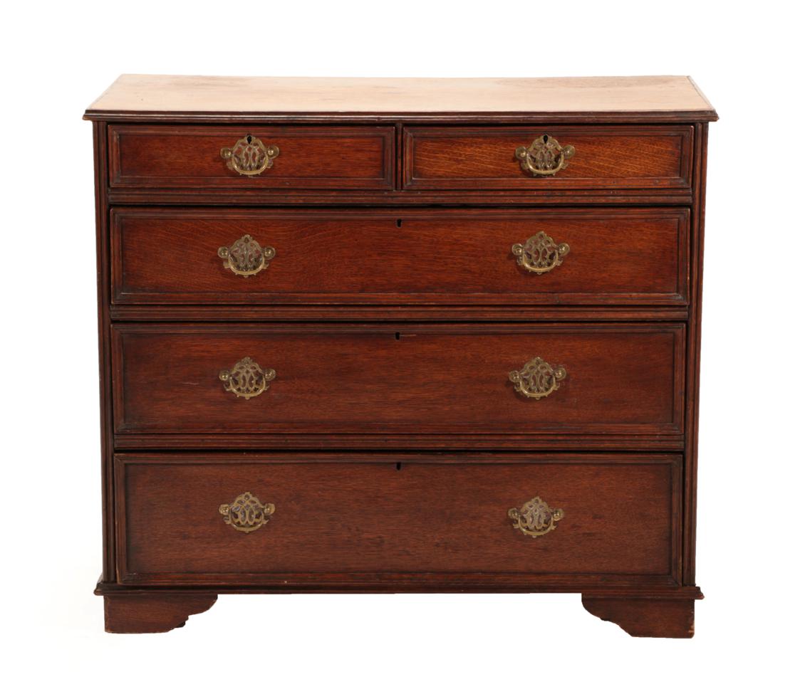 Lot 673 - An Early 18th Century Straight Front Chest of Drawers, the moulded top above two short and...