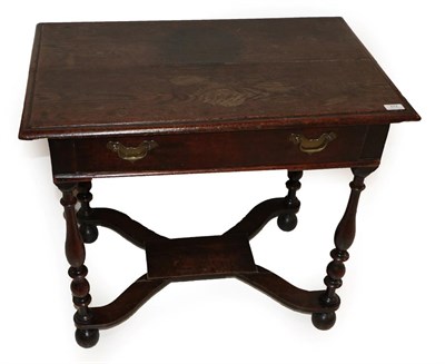 Lot 674 - A Late 17th Century Oak Side Table, the rectangular moulded top with a frieze drawer, on turned...