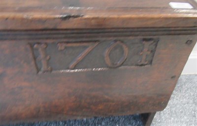 Lot 678 - An Oak Chest, dated and initialled 1701 EAT, of six plank construction, the hinged lid above an...