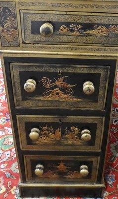 Lot 683 - An Early 20th Century Chinoiserie Black and Gilt Decorated Partners' Desk, decorated throughout...