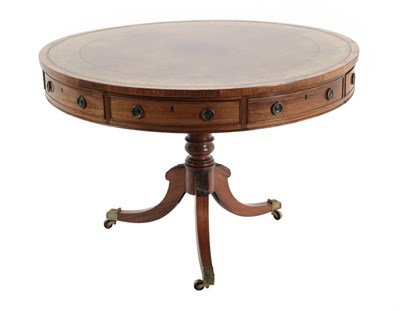 Lot 684 - A Regency Rosewood Revolving Drum Table, early 19th century, the brown and gilt leather surface...