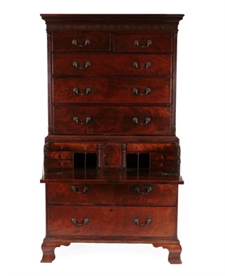 Lot 689 - A George III Mahogany Secretaire Chest on Chest, late 18th century, the dentil cornice above a...
