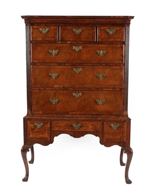 Lot 693 - A George II Walnut Chest on Stand, 2nd quarter 18th century, the moulded top above three short...