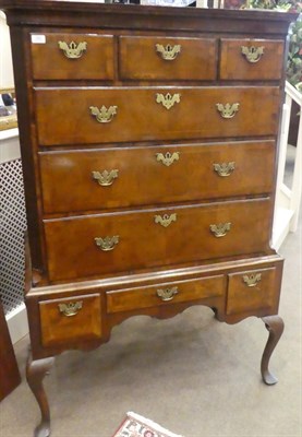 Lot 693 - A George II Walnut Chest on Stand, 2nd quarter 18th century, the moulded top above three short...