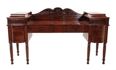 Lot 695 - A Regency Mahogany Sideboard, in the manner of Gillows, early 19th century, with scrolled...