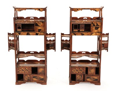 Lot 704 - A Pair of Early 20th Century Japanese Elm and Parquetry Decorated Free-Standing Display Stands,...