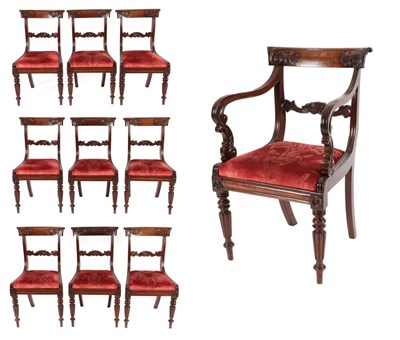 Lot 712 - A Set of Nine Carved Mahogany Dining Chairs, circa 1820/30, including one carver, with carved...