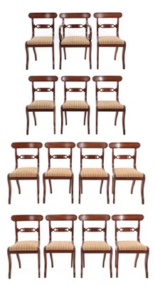 Lot 720 - A Set of Fourteen Mahogany Dining Chairs, circa 1820/30, including one carver, recovered in...