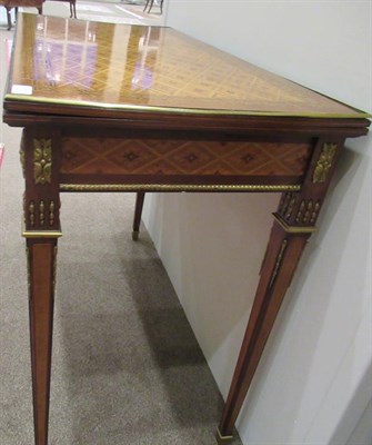 Lot 723 - A Louis XVI Style Mahogany, Parquetry and Gilt Metal Mounted Foldover Card Table, 3rd quarter...