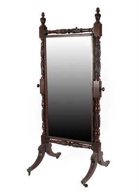 Lot 727 - An Impressive Carved Mahogany Cheval Mirror, circa 1820/30, the original pivoting mirror plate...