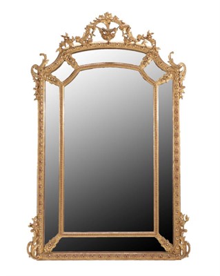 Lot 737 - A French Third Republic Carved Giltwood and Gesso Mirror, in Louis XVI style, with mirror...