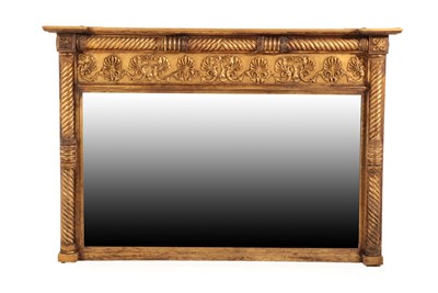 Lot 739 - A Carved Giltwood and Gesso Overmantel Mirror, circa 1810, the breakfront pediment above a...