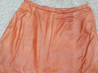 Lot 2218 - Bill Gibb Brown Leather Skirt and Jacket Ensemble, Autumn/Winter 1972, stencilled with naturalistic