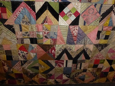 Lot 2050 - A Decorative 19th Century Patchwork Quilt With 18th Century Embroidery Patches, comprising a varied