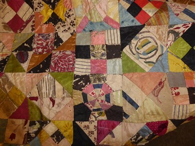Lot 2050 - A Decorative 19th Century Patchwork Quilt With 18th Century Embroidery Patches, comprising a varied