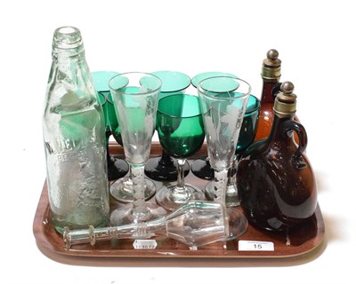 Lot 15 - Rylands of Barnsley glass 'Cog' bottle; a pair of Victorian brown glass decanters; a 19th...