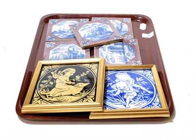 Lot 30 - A pair of Minton framed fairy tiles and five Delft tiles