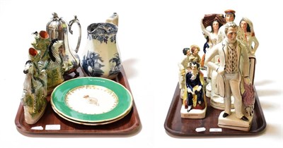 Lot 50 - A quantity of Staffordshire flat-back figures, a Staffordshire pocket watch stand, a pair of...